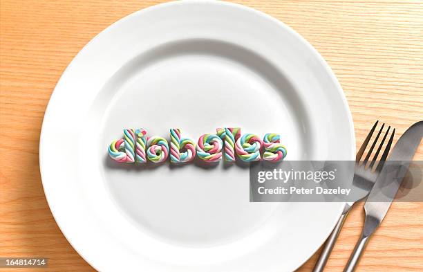 diabetes sweet on plate - sugar stockfoto's en -beelden