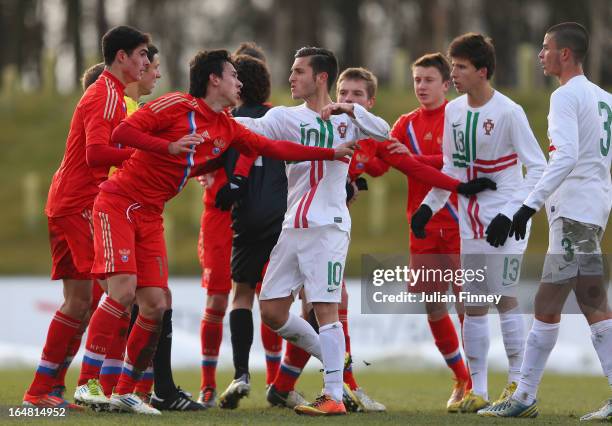 Players argue at the full time during the UEFA European Under-17 Championship Elite Round match between Russia and Portugal on March 28, 2013 in...