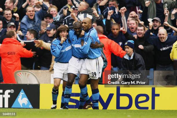 Shaun Goater of Manchester City celebrates his second goal with team-mates Eyal Berkovic and Nicolas Anelka during the FA Barclaycard Premiership...