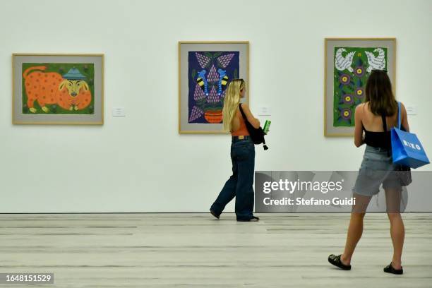 People view the works inside the Saatchi Gallery on August 23, 2023 in London, England. London is the capital of England, many of the inhabitants,...