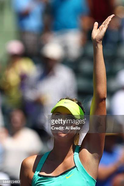 Maria Sharapova of Russia celebrates match point against Jelena Janovic of Serbia during the Womens Semi Finals on Day 11 of the Sony Open at the...