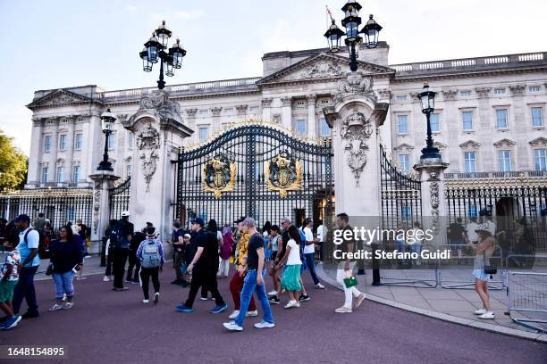 General view of tourists visit the exterior of Buckingham Palace on August 23, 2023 in London, England. London is the capital of England, many of the...