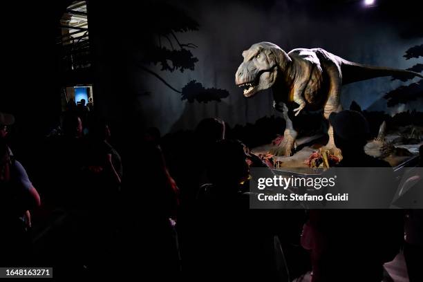 General view of tourists looks the Tyrannosaurus Rex replica at the Natural History Museum on August 23, 2023 in London, England. London is the...