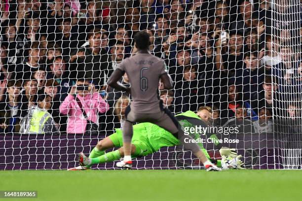 Marek Rodak of Fulham saves the penalty of Davinson Sanchez of Tottenham Hotspur in the penalty shoot out during the Carabao Cup Second Round match...