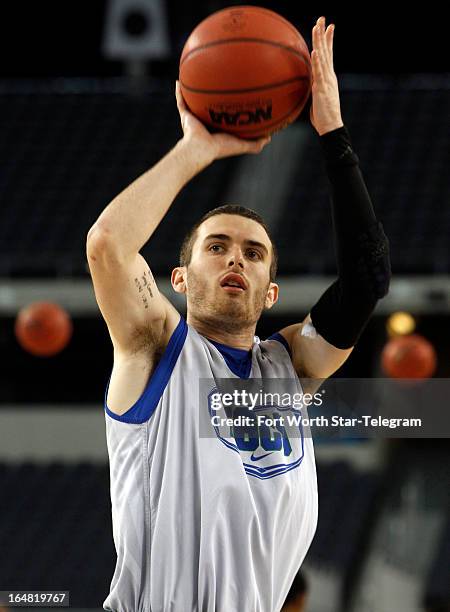 Florida Gulf Coast's Brett Comer takes a shot during practice at Cowboys Stadium in Arlington, Texas, on Thursday, March 28, 2013. The Eagles meet...