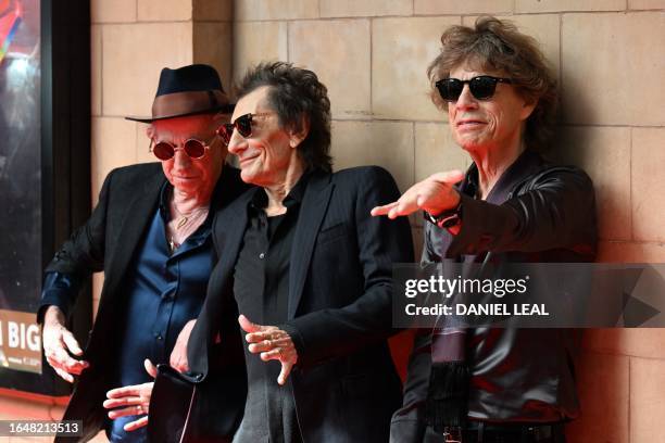 Keith Richards, Ron Wood and Mick Jagger of legendary British rock band, The Rolling Stones pose as they arrive to attend a launch event for their...