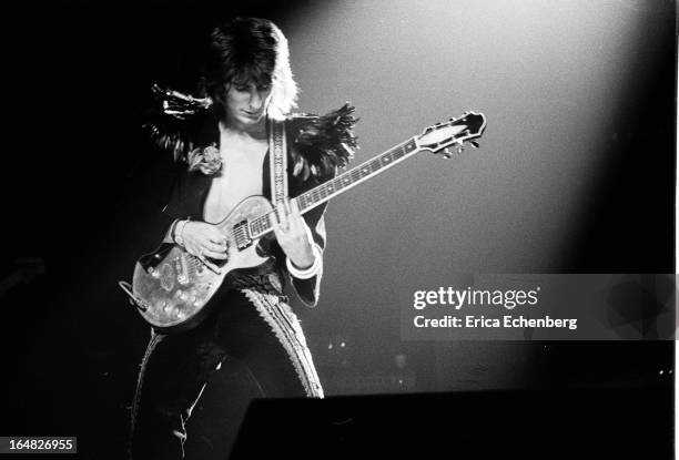 21st NOVEMBER: Guitarist Ronnie Wood from Faces performs live on stage at Lewisham Odeon in London on 21st November 1974.