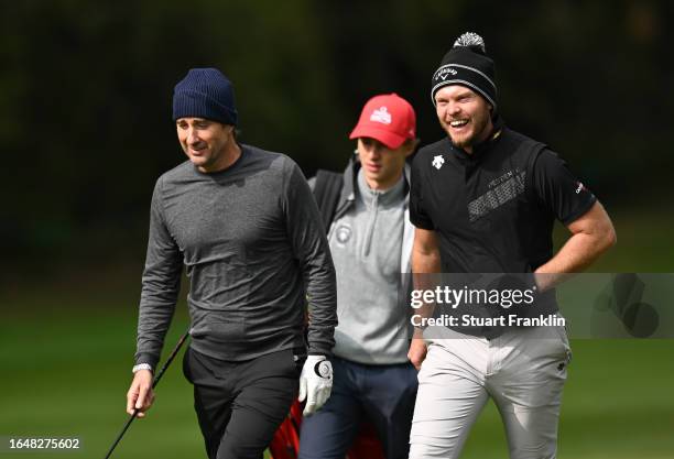 Danny Willett of England actor Luke Wilson of USA during the pro-am prior to the start of the Omega European Masters at Crans-sur-Sierre Golf Club on...