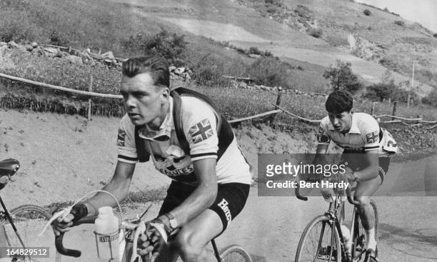 British cyclists Brian Robinson and Freddie Krebs during the ninth stage of the Tour de France, between Briancon and Monaco, 15th July 1955. This is...