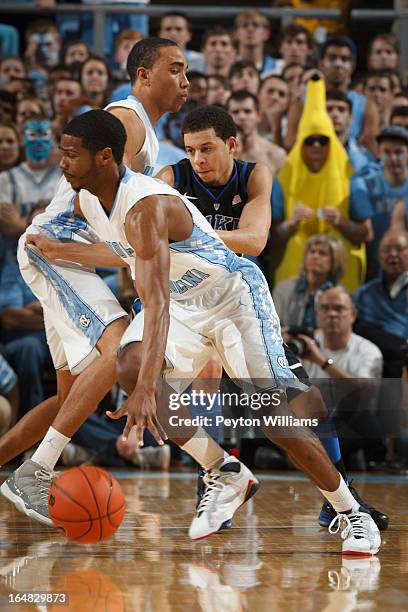 Dexter Strickland of the North Carolina Tar Heels dribbles the ball during a game against the Duke Blue Devils on March 09, 2013 at the Dean E. Smith...