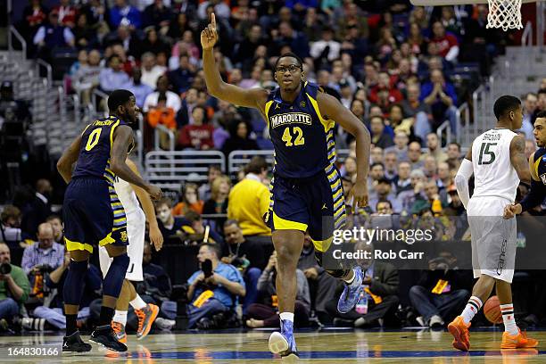 Chris Otule of the Marquette Golden Eagles reacts after a play against the Miami Hurricanes during the East Regional Round of the 2013 NCAA Men's...