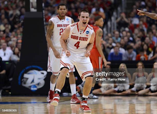 Aaron Craft of the Ohio State Buckeyes celebrates in the second half while taking on the Arizona Wildcats during the West Regional of the 2013 NCAA...