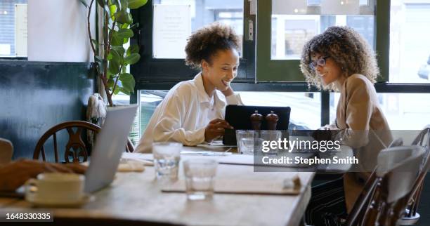 two friends meeting in cafe - coworkers having fun stock pictures, royalty-free photos & images