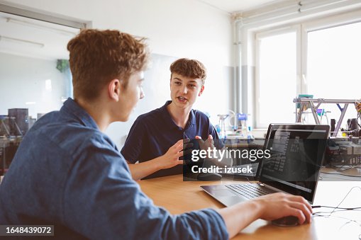 High school student learing coding High school student learing coding