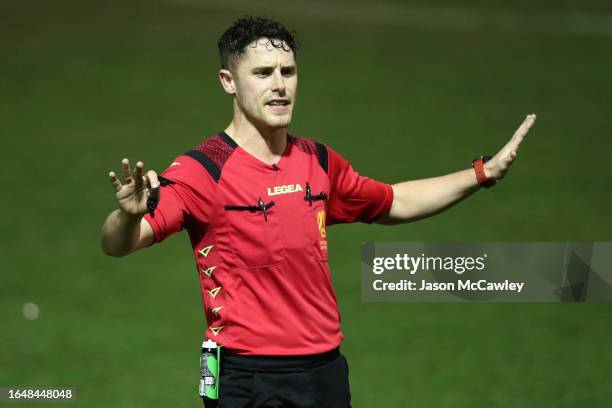 Jack Morgan referees during the Australia Cup 2023 Round of 16 match between Mt Druitt Town Rangers FC and Heidelberg United FC at Pondetta Park on...
