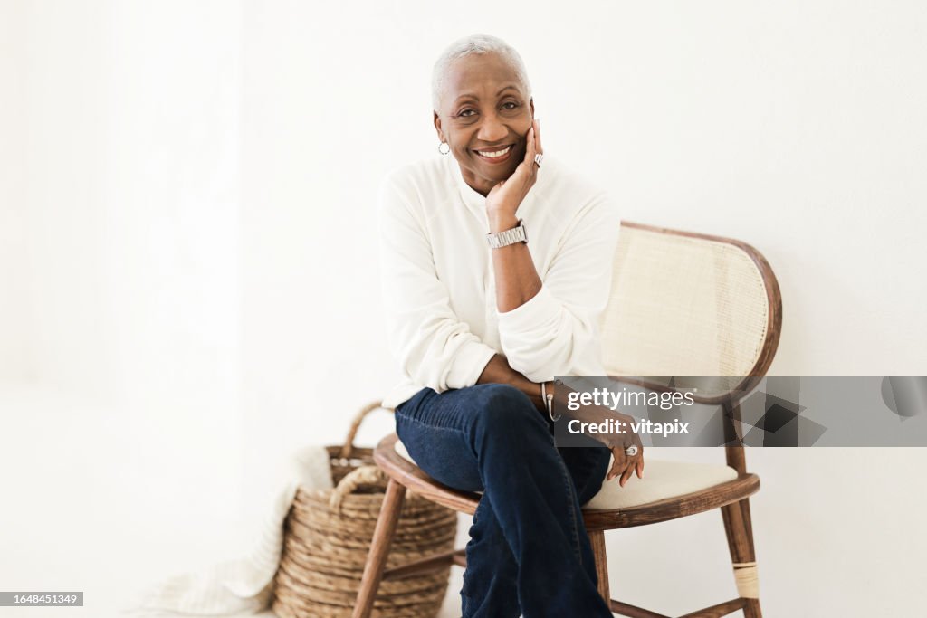 Confident Black Woman in White Shirt