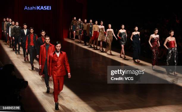 Models showcase designs on the catwalk during the Asahi Kasei Creativity Award Wang Yutao collection show on the fifth day of Mercedes-Benz China...