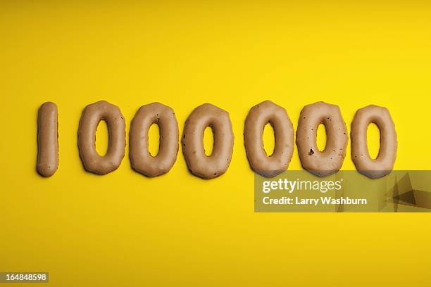 one million arranged in russian bread cookies - 1 million stock-fotos und bilder