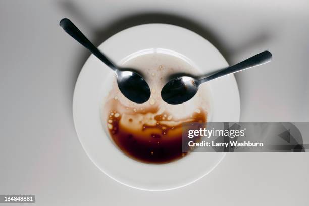 abstract face made from spoons, plate and balsamic vinegar - balsamico stock-fotos und bilder