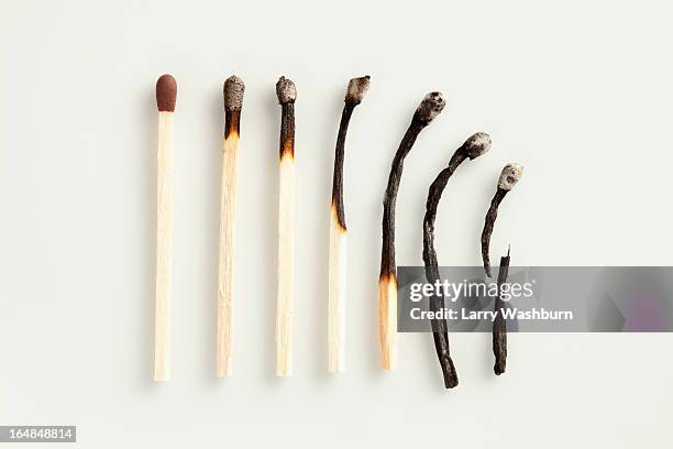 a gradual decline of matches - matchstick stock pictures, royalty-free photos & images