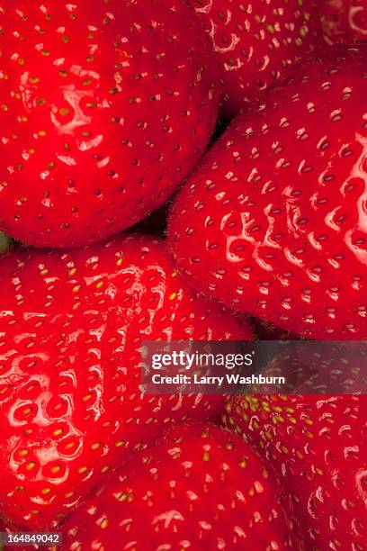 a heap of strawberries, close-up, full frame - strawberry texture stock pictures, royalty-free photos & images