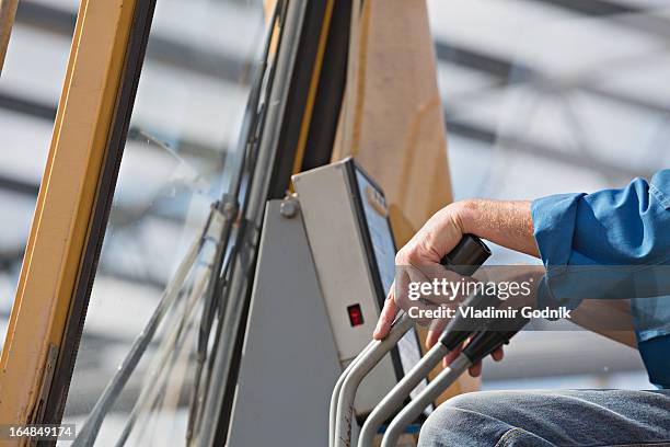 backhoe driver - lever stock pictures, royalty-free photos & images