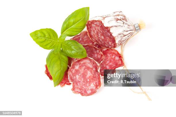 salami sliced on the white background - embutido stock-fotos und bilder