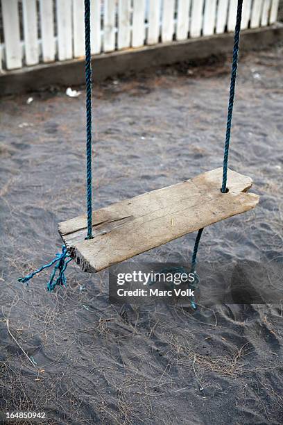 an old weathered wood swing, close-up, high angle view - krakatau island stock pictures, royalty-free photos & images