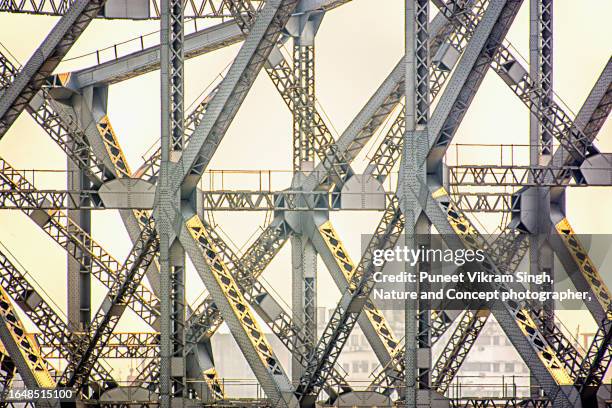 part of steel structure of howrah bridge captured with a telephoto lens - howrah bridge stockfoto's en -beelden