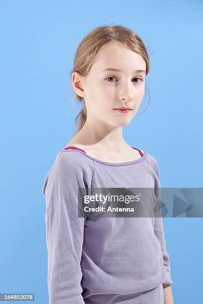 a girl looking seriously into the camera - serious child stock pictures, royalty-free photos & images