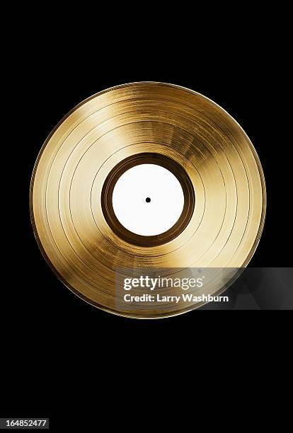 a gold record on a black background - record 個照片及圖片檔