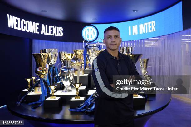 Alexis Sanchez poses at headquarter of FC Internazionale on August 25, 2023 in Milan, Italy.