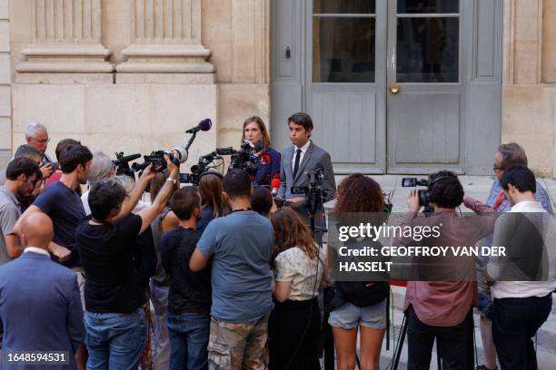 French Education and Youth Minister Gabriel Attal , flanked by French Junior Minister for the Education and Professional training Carole Grandjean,...