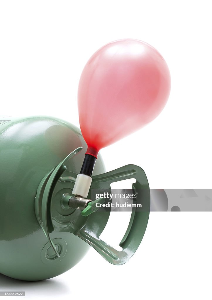 Helium gas cylinder and balloon isolated on white background