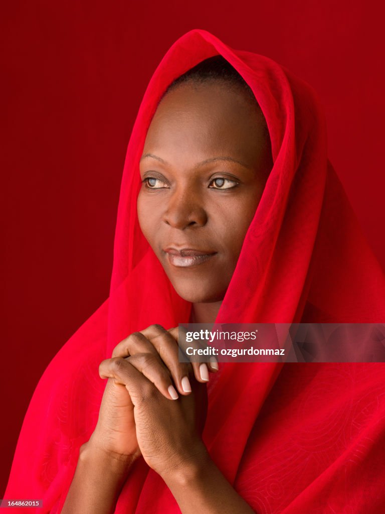 Praying African woman