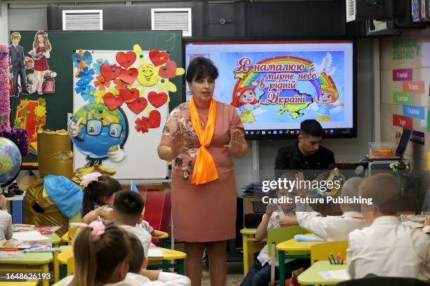 Teacher holds a lesson in a classroom set up at a metro station for safety reasons, Kharkiv, northeastern Ukraine. On Monday, September 4, more than...