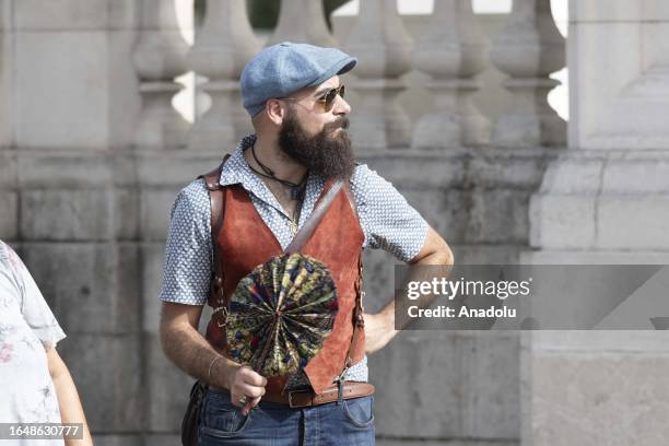 Man is seen during the hot weather in London, United Kingdom on September 06, 2023. The British Meteorological Office , which issued a 'red' alarm by...