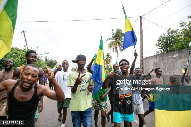 Gabonese people rejoicing in a street in Port-Gentil , on August 30, 2023 after the announcement of the Coup d'Etat perpetrated by the Gabonese...