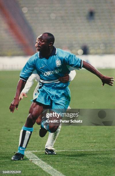 Ghanaian footballer Abedi Pele in action for 1860 Munich during the UEFA Cup First Round, Second Leg, match between 1860 Munich and FC Jazz, held at...