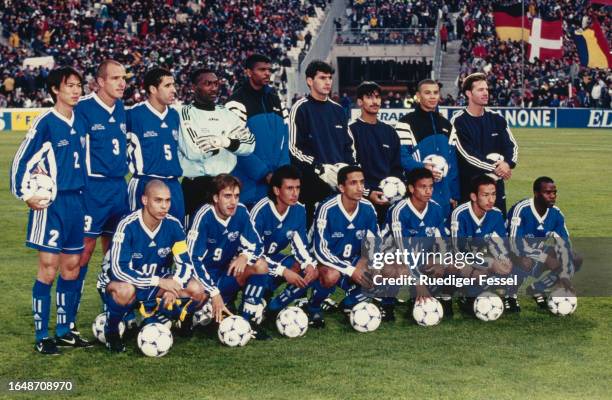 The Rest of the World XI pose for a team photo ahead of the International Friendly between a Europe XI and a Rest of the World XI, held at the Stade...