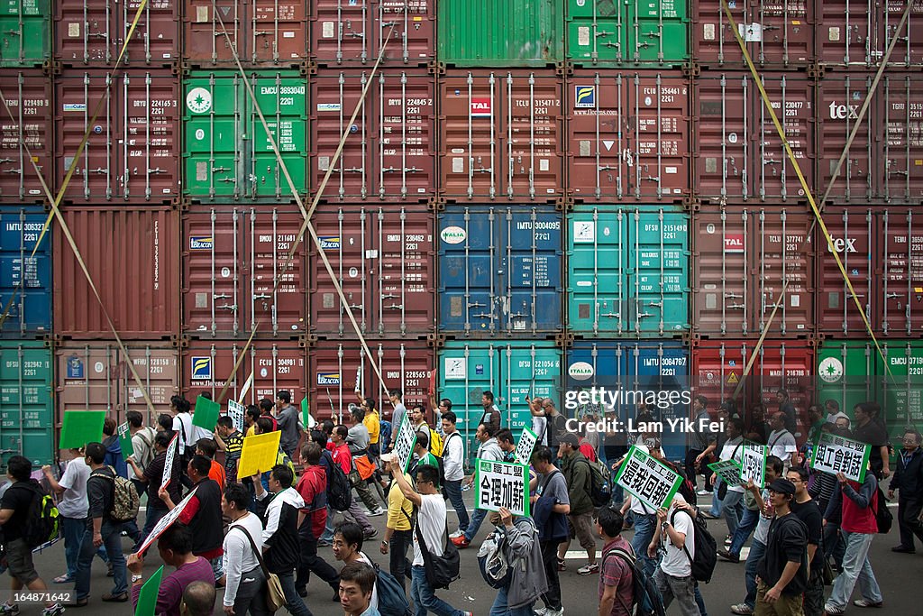 Dock Workers Stage Sit-In To Protest Wages