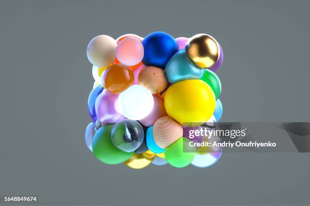 spheres into cubic shape. - variation stock-fotos und bilder