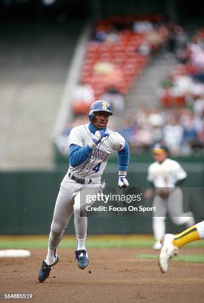 Harold Reynolds of the Seattle Mariners runs the bases against the Oakland Athletics during an Major League Baseball game circa 1991 at The...