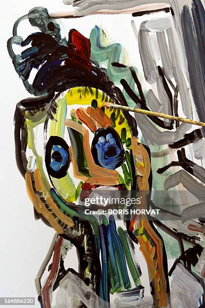 Patient of the psychiatric hospital of Monfavet, near Avignon, southeastern France, paints on March 27, 2013 during a painting workshop in the "Marie...