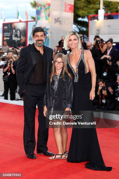 Pierfrancesco Favino, Lea Favino and Anna Ferzetti attend the opening red carpet at the 80th Venice International Film Festival on August 30, 2023 in...