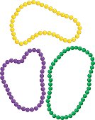 Three different colored Mardi Gras beads