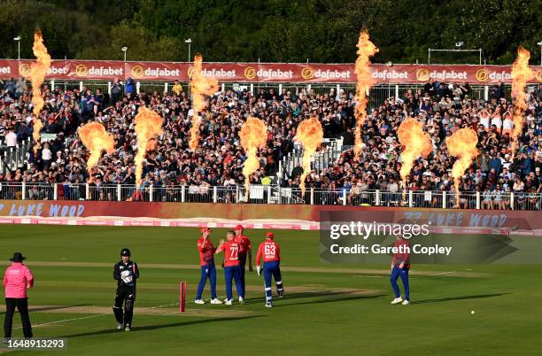 Fireworks go off as Luke Wood of England celebrates with teammates after dismissing Tim Seifert of New Zealand during the 1st Vitality T20...