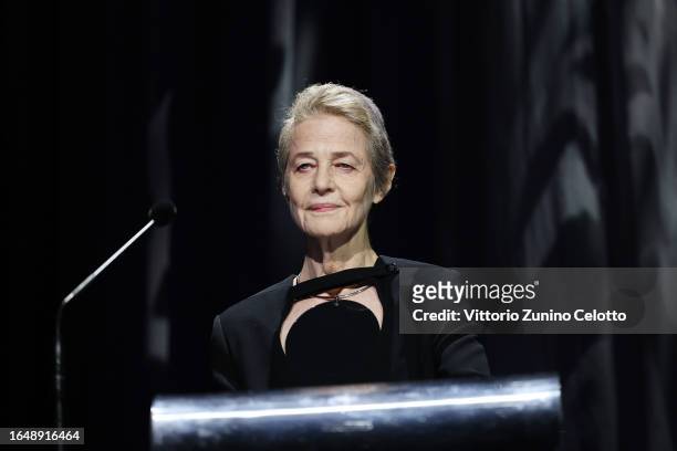Charlotte Rampling speaks on stage at the opening ceremony at the 80th Venice International Film Festival on August 30, 2023 in Venice, Italy.