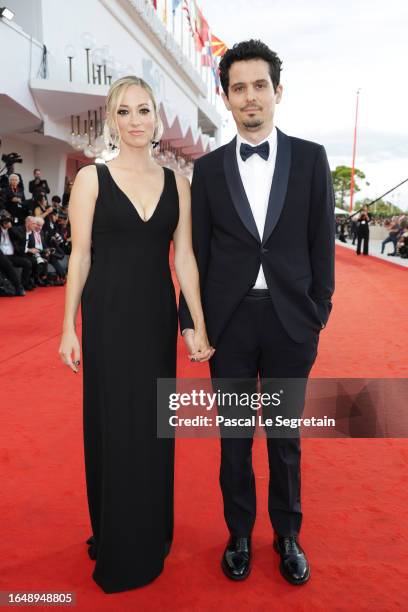 Olivia Hamilton and Damien Chazelle attend the opening red carpet at the 80th Venice International Film Festival on August 30, 2023 in Venice, Italy.