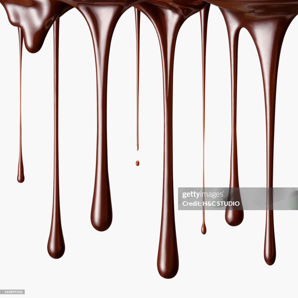 Chocolate falling in drops